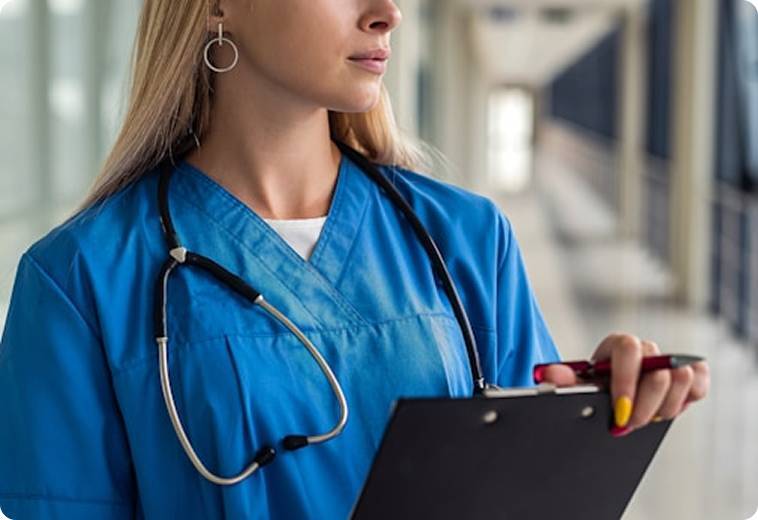 A lady healthcare worker holding a file