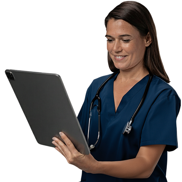 A female healthcare professional in blue scrubs is holding a tablet and smiling version 2